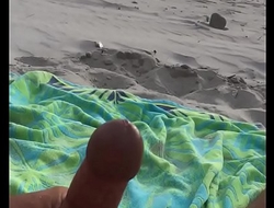 Throbing cock masterbate at a public beach!