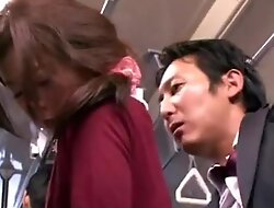 Japanese supplicant fucking an amateur oriental woman in bus